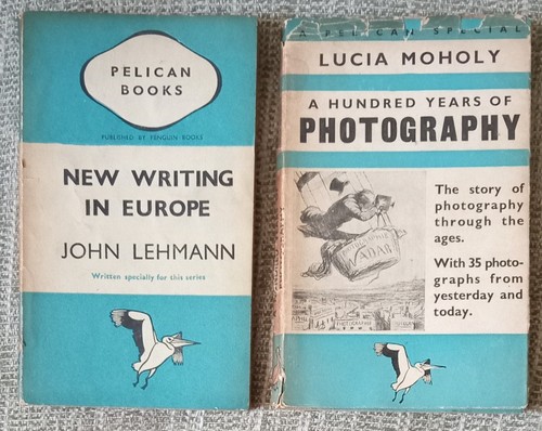 Two early pelican paperback - two,